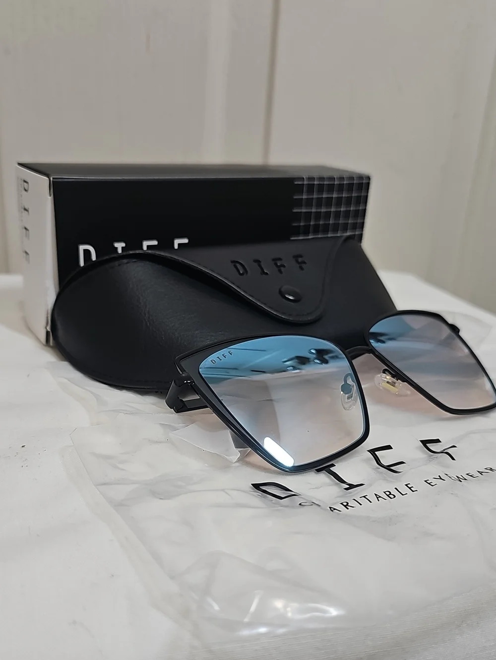 DIFF Charitable Becky Eyewear Black Frame Sunglasses with Blue-Gradient Lenses